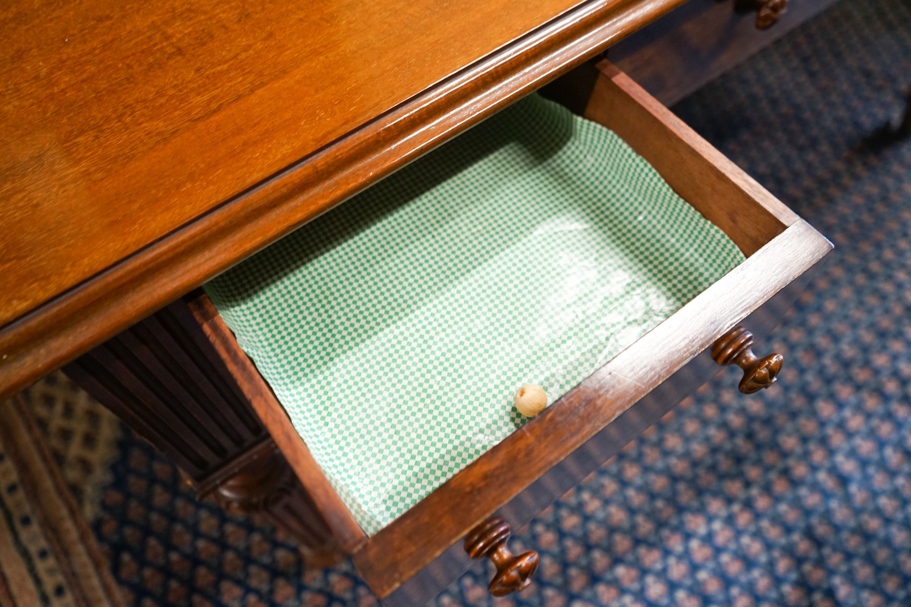 A Victorian mahogany dressing-cum-writing table